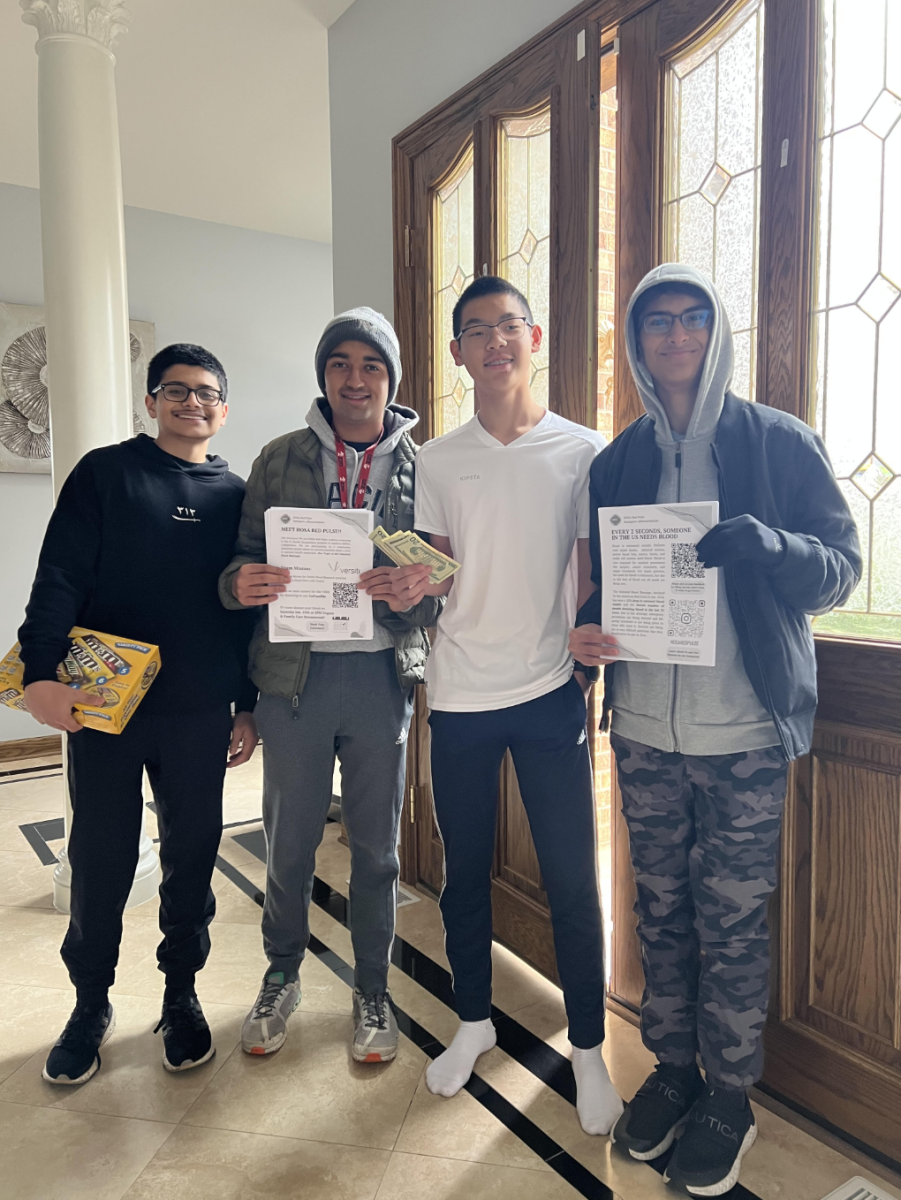 Sophomores Armaan Rizvi, Rishin Patel, Wen Han Lee and Haaris Ansari (left to right) advocate for Red Pulse’s upcoming community blood drive. Photo courtesy of Rishin Patel, ‘27.